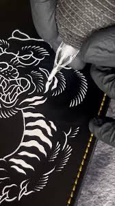 Transforming Leather apparel with Tattooed Designs